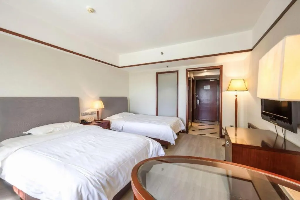 Bed in Starmoon Hotel