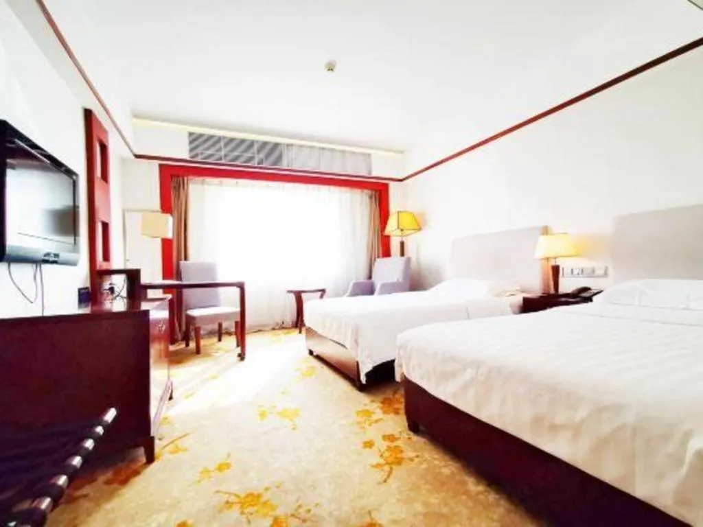 Bed in Starmoon Hotel