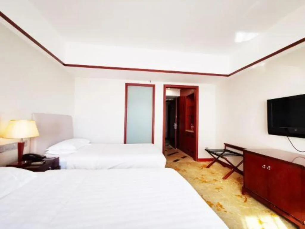 Bed in Starmoon Hotel