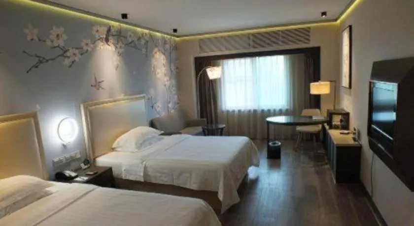 Bed in Starmoon Hotel