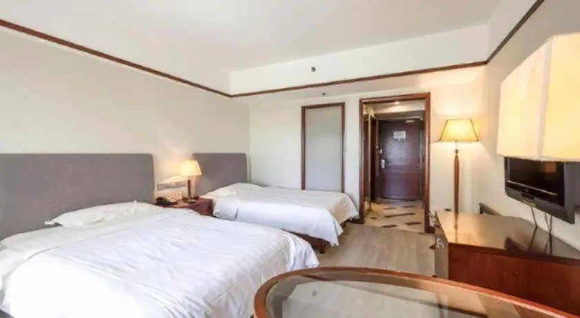 Bed in Starmoon Hotel