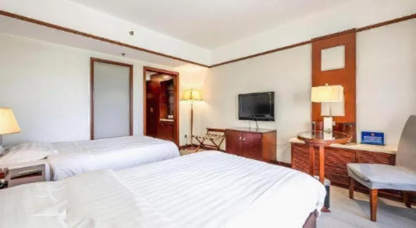 Bed in Starmoon Hotel