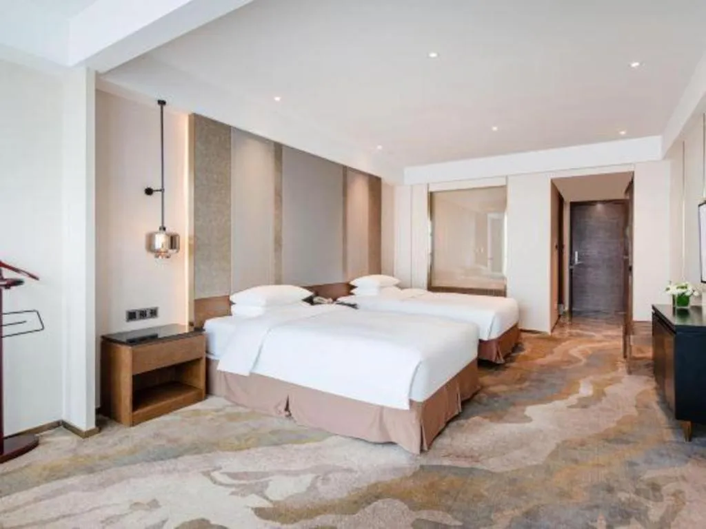 Bed in Grand Metropark Hotel Chongqing