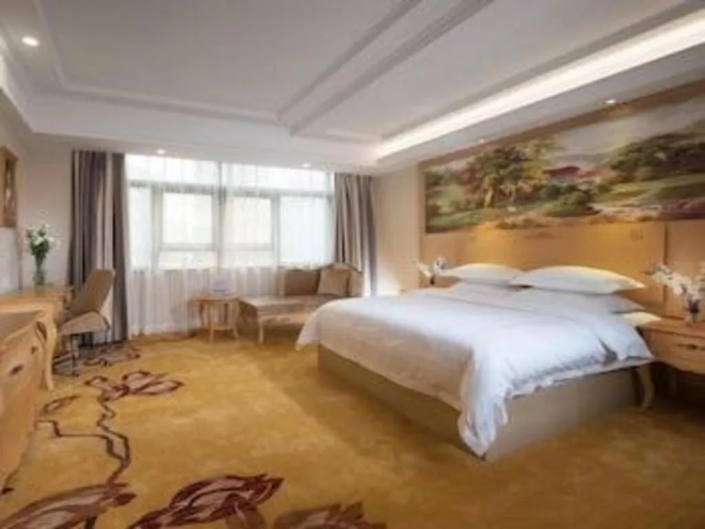 Bed in GreenTree Inn Shenzhen DonGMEn Business Hotel