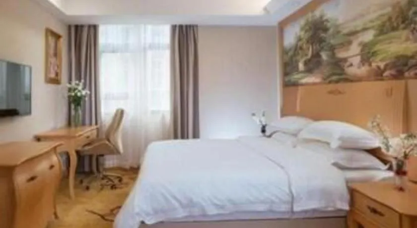 Bed in GreenTree Inn Shenzhen DonGMEn Business Hotel