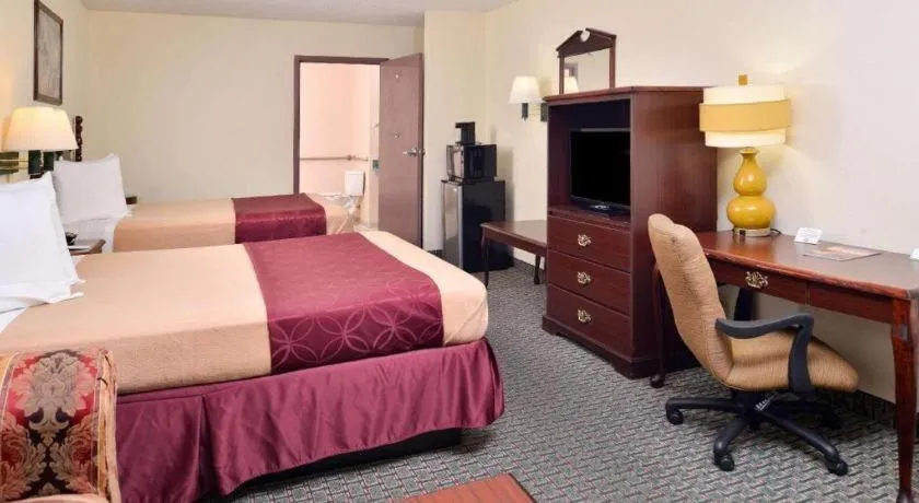 Bed in Americas Best Value Inn Gonzales