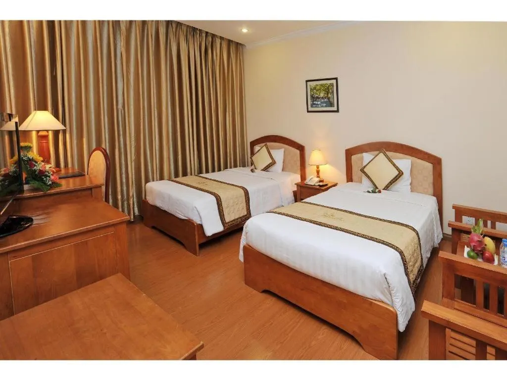 Bed in Bamboo Green Hotel