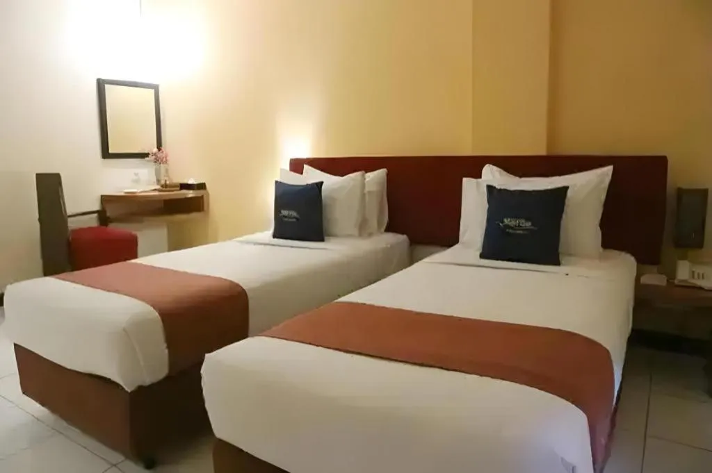 Bed in Hotel Marlin Pekalongan Managed by Dafam