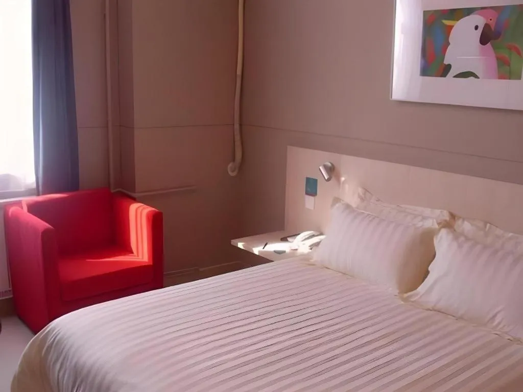 Bed in Jinjiang Inn Qingdao Development Zone Jinggangshan Rd.