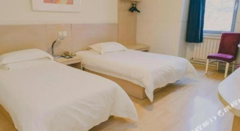 Bed in Jinjiang Inn Qingdao Development Zone Jinggangshan Rd.