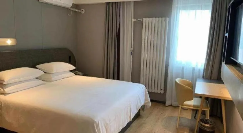 Bed in Jinjiang Inn Qingdao Development Zone Jinggangshan Rd.