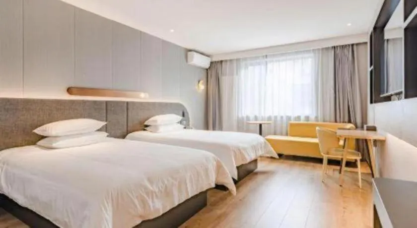 Bed in Jinjiang Inn Qingdao Development Zone Jinggangshan Rd.
