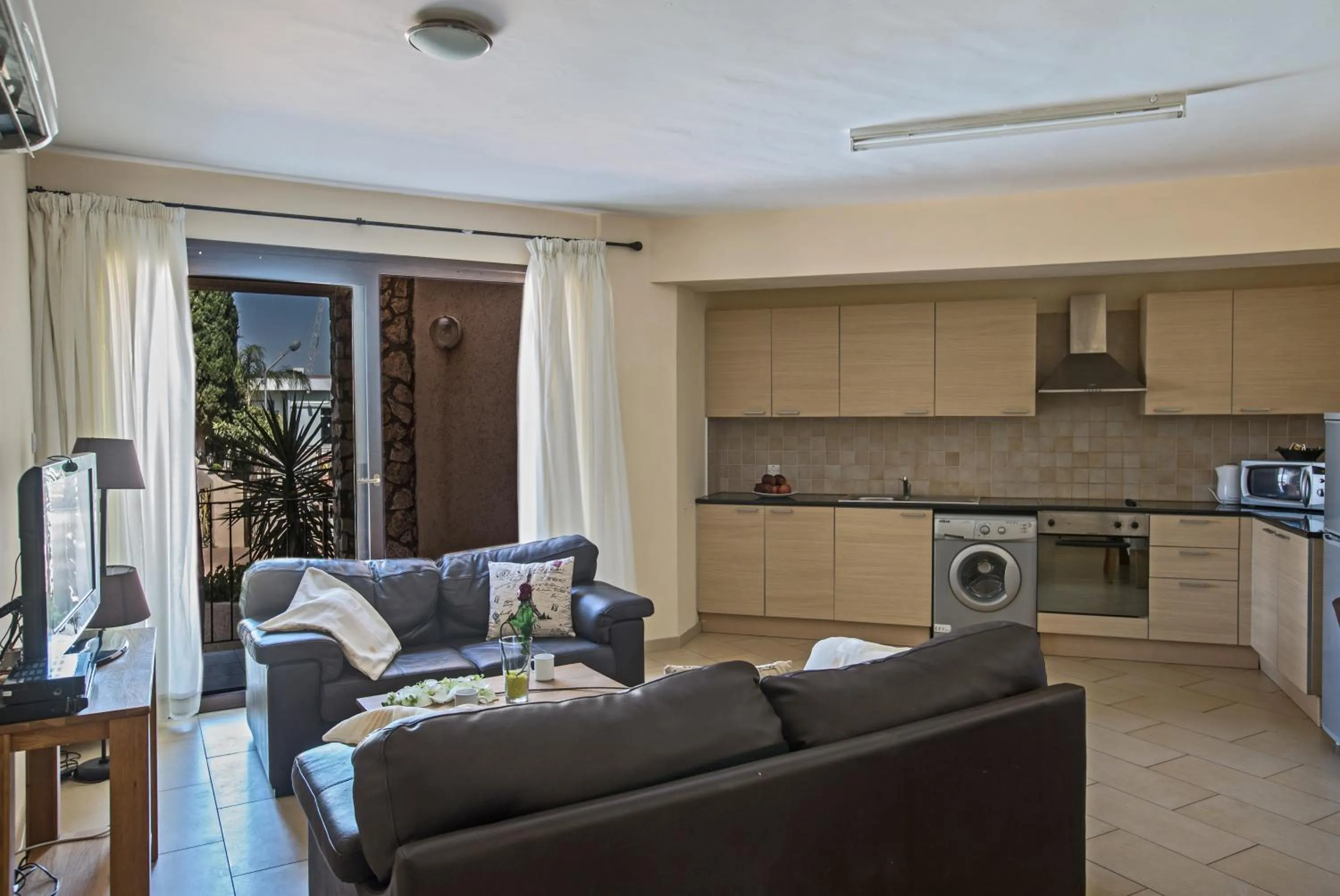 Kitchen or kitchenette in Napiana Apartments