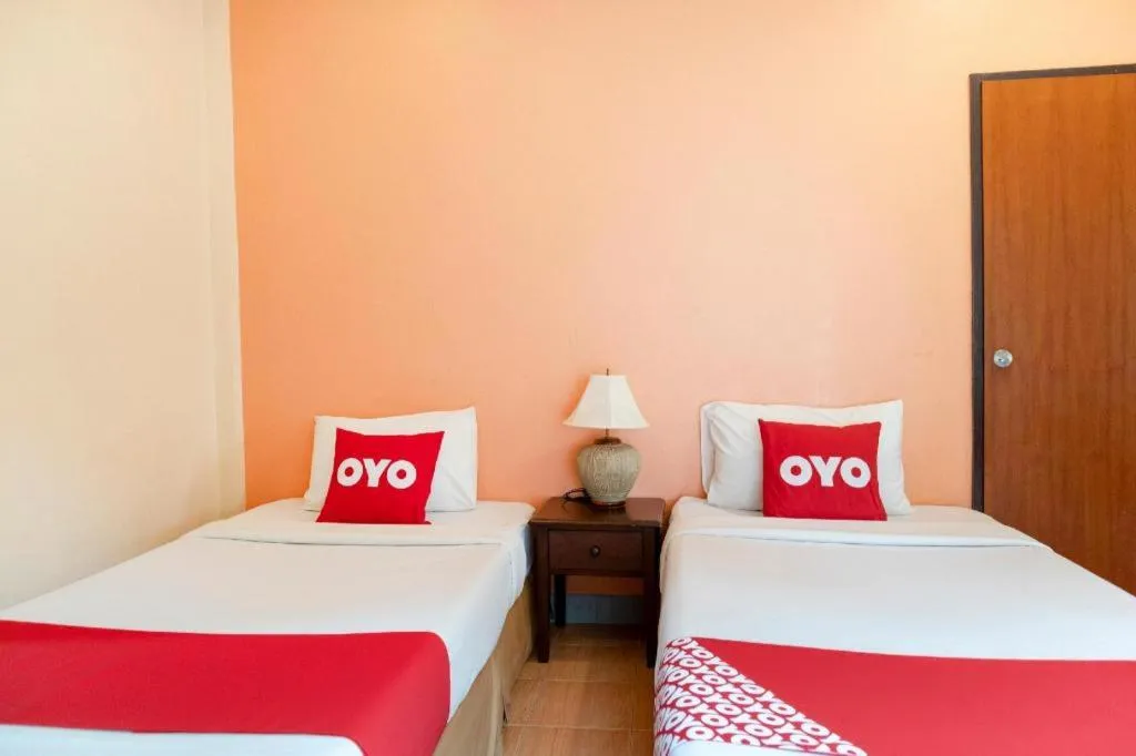 Bed in OYO 1046 Noppharat resort