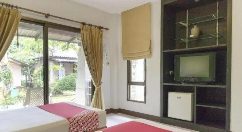 Bed in OYO 1046 Noppharat resort