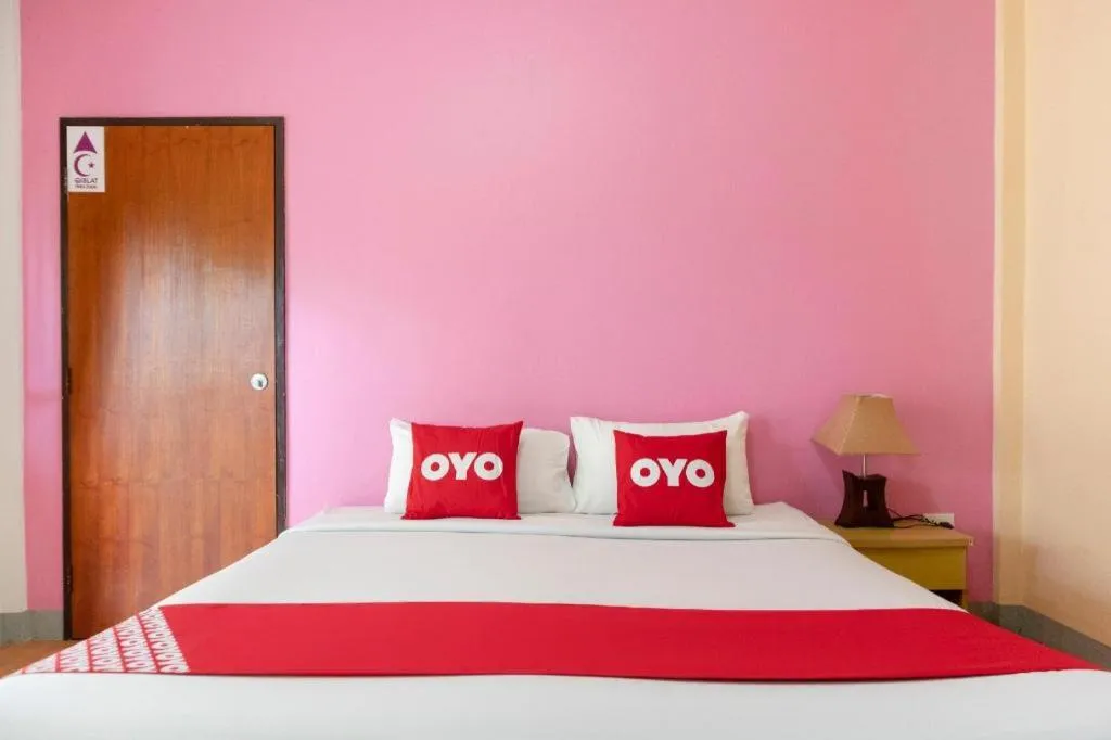 Bed in OYO 1046 Noppharat resort