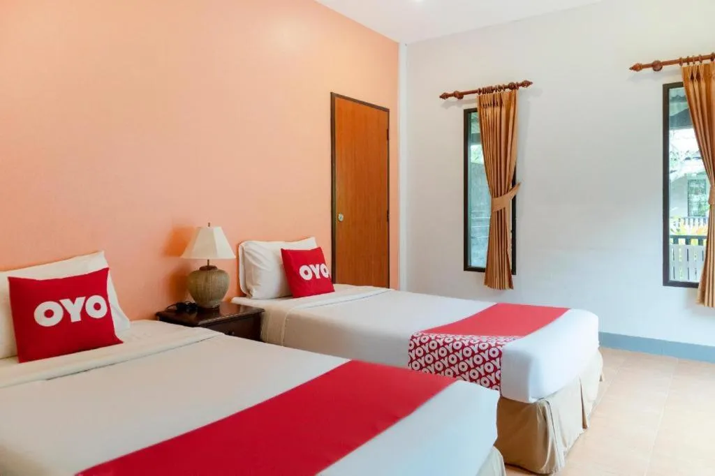 Bed in OYO 1046 Noppharat resort