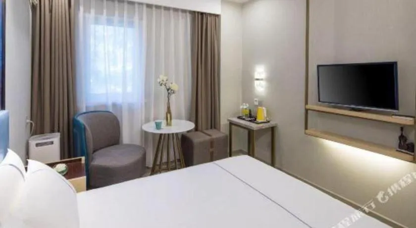 Bed in Magnotel Shanghai Maglev Station