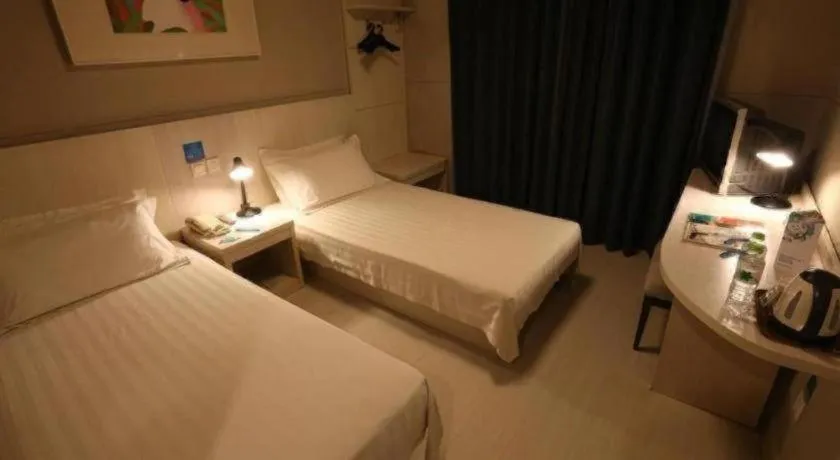 Bed in Jinjiang Inn Wuhu Fangte Tech Museum Metro Station