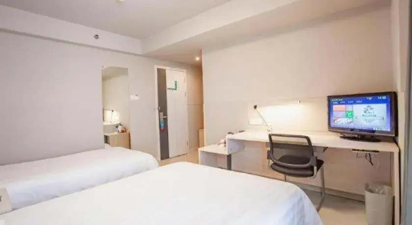 Bed in Jinjiang Inn Wuhu Fangte Tech Museum Metro Station Bed in Jinjiang Inn Wuhu Fangte Tech Museum Metro Station