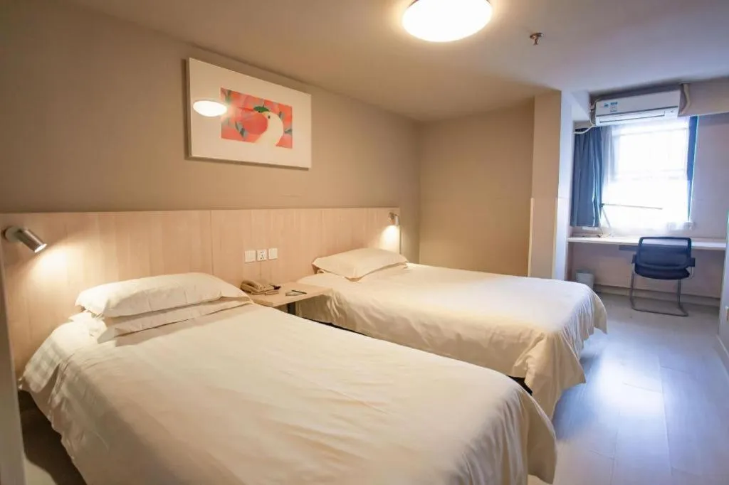 Bed in Jinjiang Inn Wuhu Fangte Tech Museum Metro Station