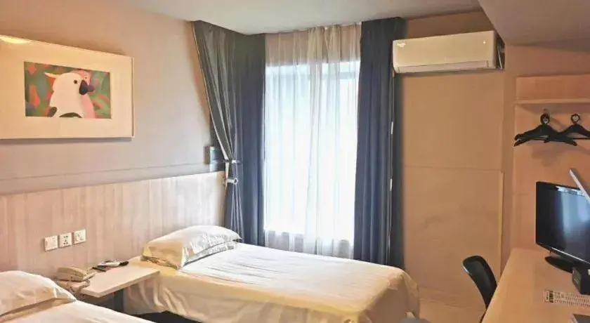 Bed in Jinjiang Inn Wuhu Fangte Tech Museum Metro Station Bed in Jinjiang Inn Wuhu Fangte Tech Museum Metro Station