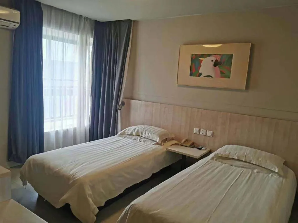 Bed in Jinjiang Inn Wuhu Fangte Tech Museum Metro Station