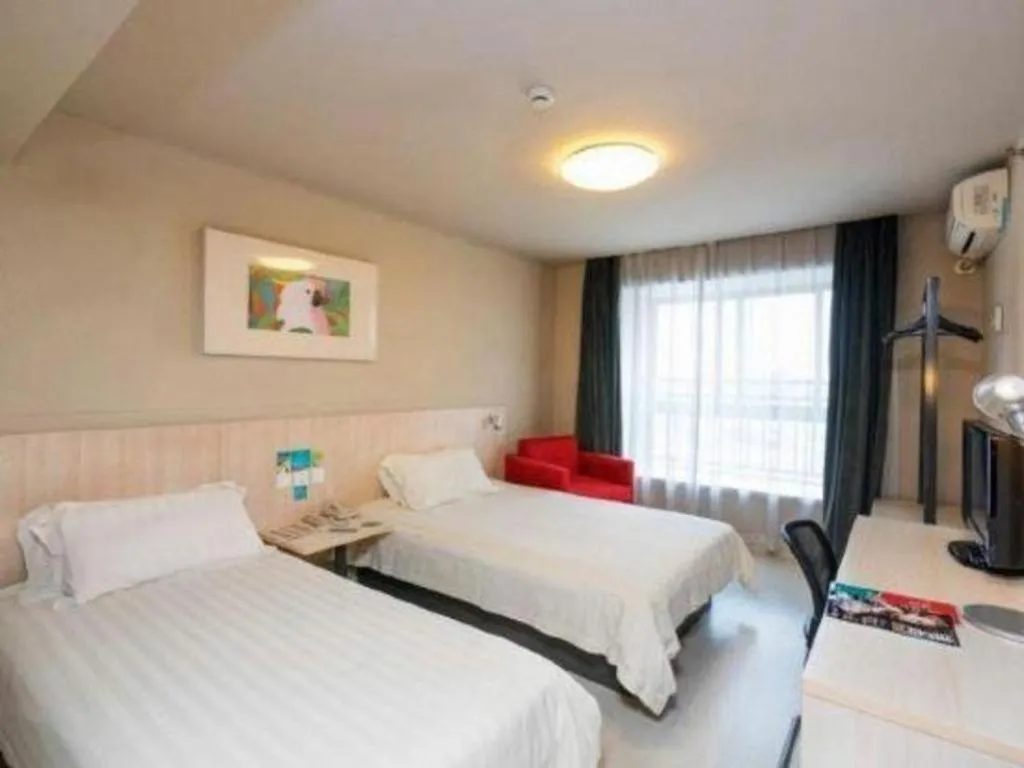 Bed in Jinjiang Inn Wuhu Fangte Tech Museum Metro Station