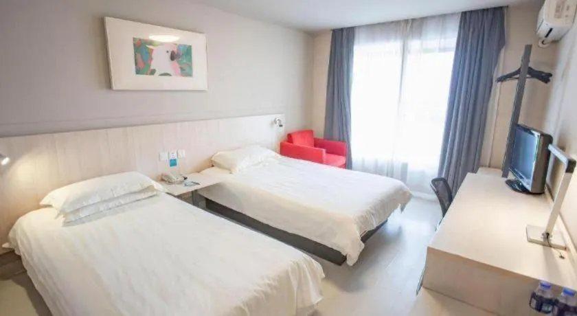 Bed in Jinjiang Inn Wuhu Fangte Tech Museum Metro Station