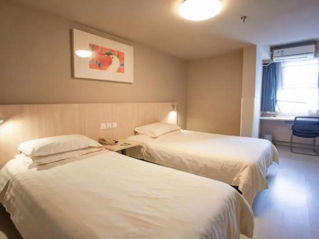 Bed in Jinjiang Inn Wuhu Fangte Tech Museum Metro Station