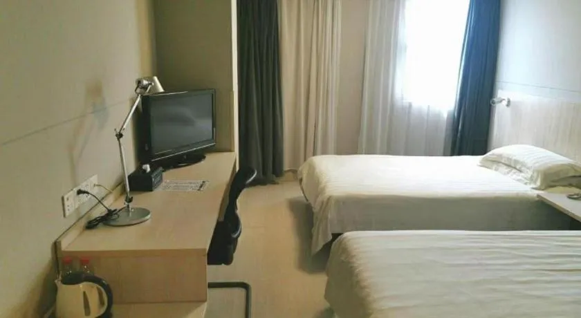 Bed in Jinjiang Inn Wuhu Fangte Tech Museum Metro Station