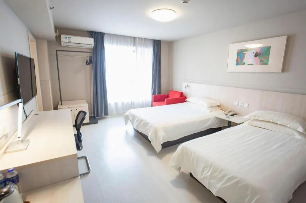 Bed in Jinjiang Inn Wuhu Fangte Tech Museum Metro Station