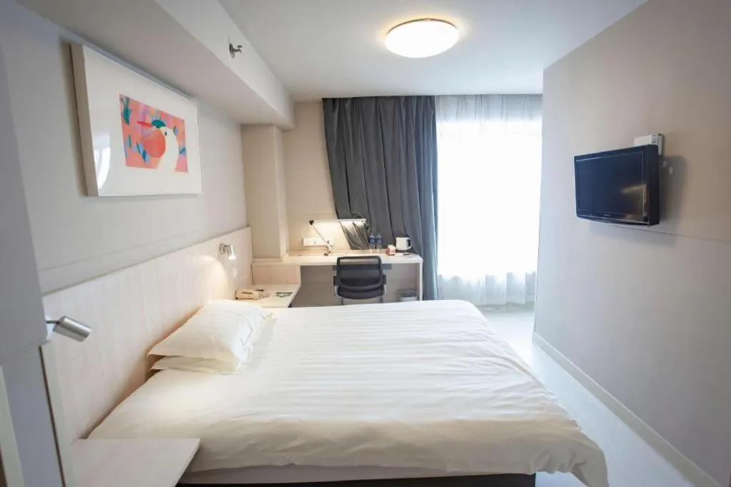 Bed in Jinjiang Inn Wuhu Fangte Tech Museum Metro Station