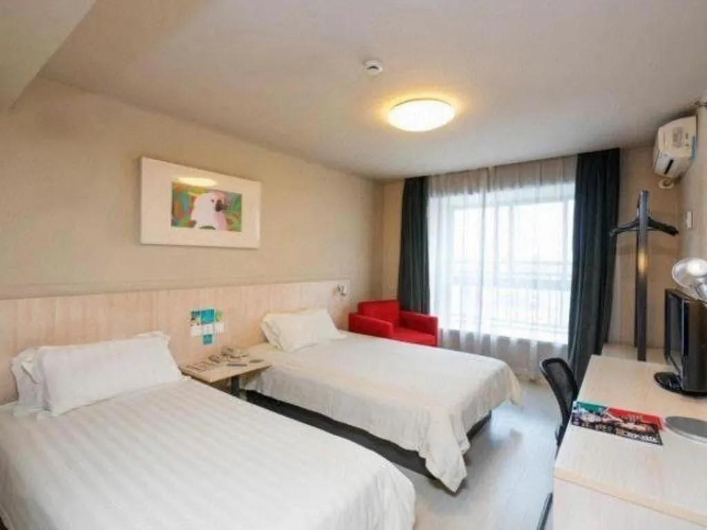 Bed in Jinjiang Inn Wuhu Fangte Tech Museum Metro Station