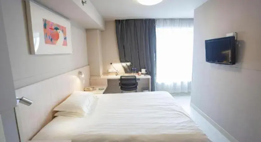 Bed in Jinjiang Inn Wuhu Fangte Tech Museum Metro Station Bed in Jinjiang Inn Wuhu Fangte Tech Museum Metro Station