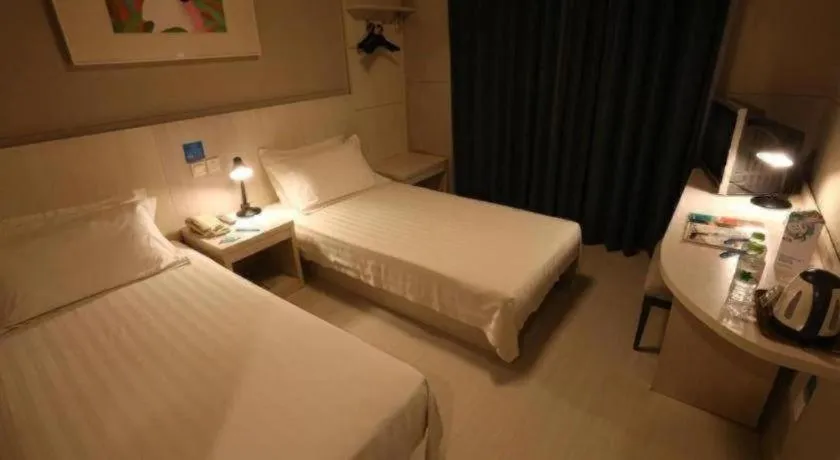 Bed in Jinjiang Inn Wuhu Fangte Tech Museum Metro Station