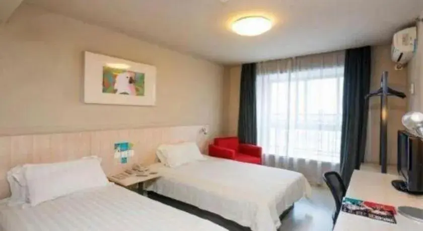 Bed in Jinjiang Inn Wuhu Fangte Tech Museum Metro Station Bed in Jinjiang Inn Wuhu Fangte Tech Museum Metro Station