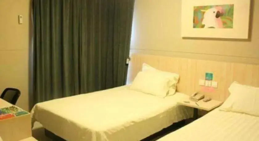 Bed in Jinjiang Inn Wuhu Fangte Tech Museum Metro Station Bed in Jinjiang Inn Wuhu Fangte Tech Museum Metro Station