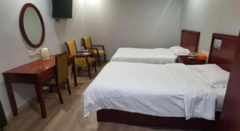 Bed in GreenTree Inn Suzhou Shengze Hotel