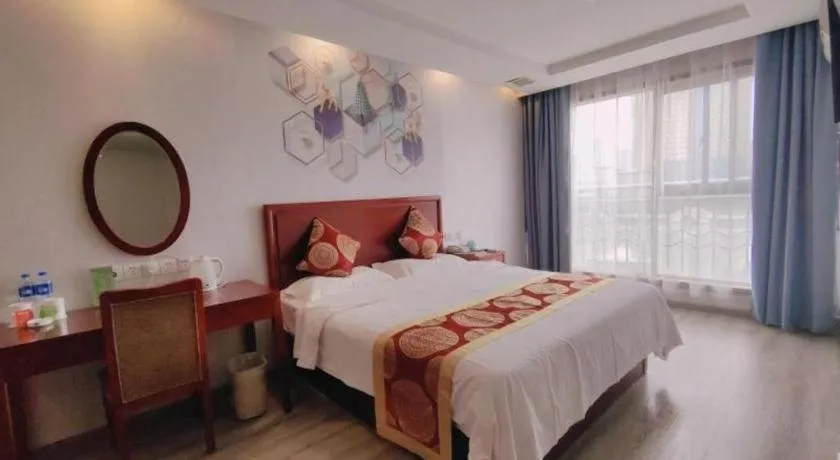 Bed in GreenTree Inn Suzhou Shengze Hotel