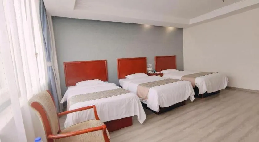 Bed in GreenTree Inn Suzhou Shengze Hotel