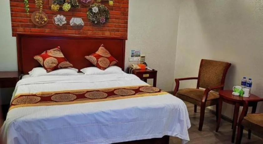 Bed in GreenTree Inn Suzhou Shengze Hotel