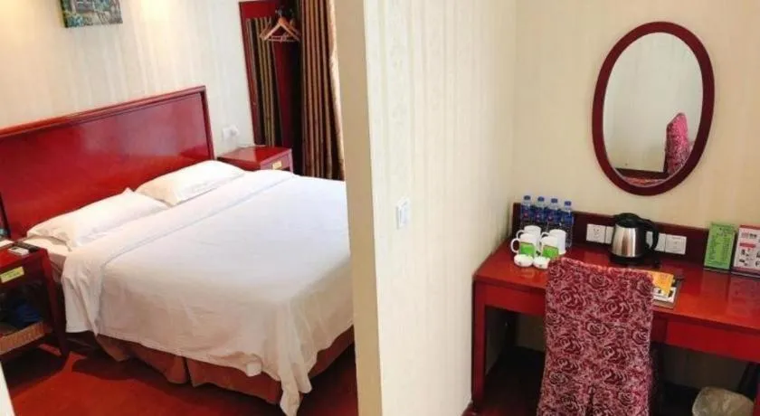 Bed in GreenTree Inn Suzhou Shengze Hotel