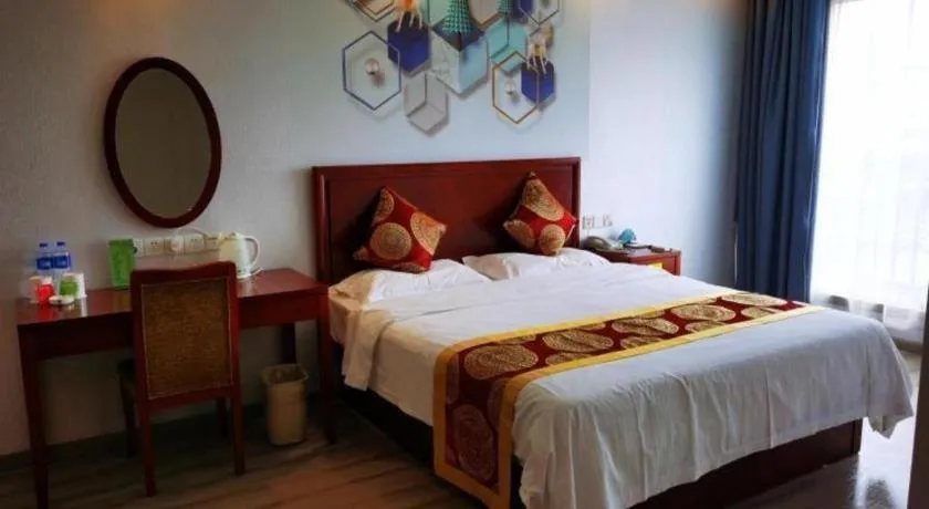 Bed in GreenTree Inn Suzhou Shengze Hotel