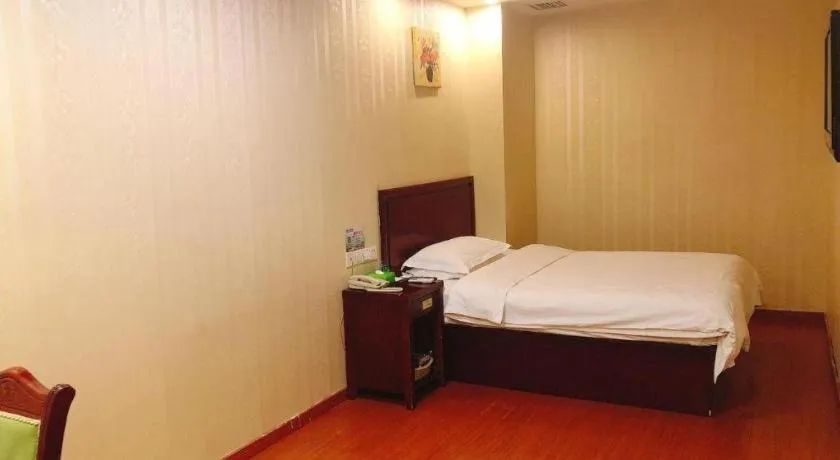 Bed in GreenTree Inn Suzhou Shengze Hotel