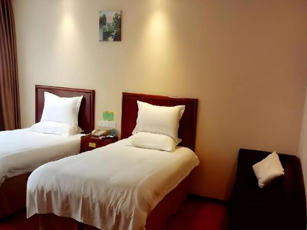 Bed in GreenTree Inn Suzhou Shengze Hotel