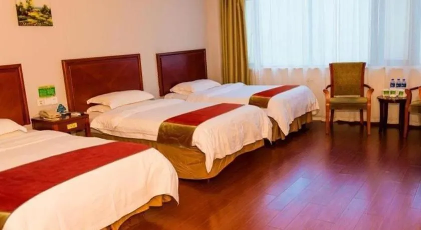 Bed in GreenTree Inn Suzhou Shengze Hotel