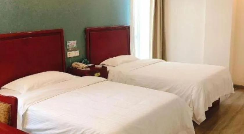 Bed in GreenTree Inn Suzhou Shengze Hotel