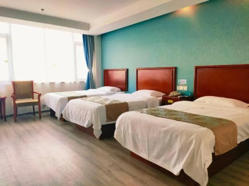 Bed in GreenTree Inn Suzhou Shengze Hotel