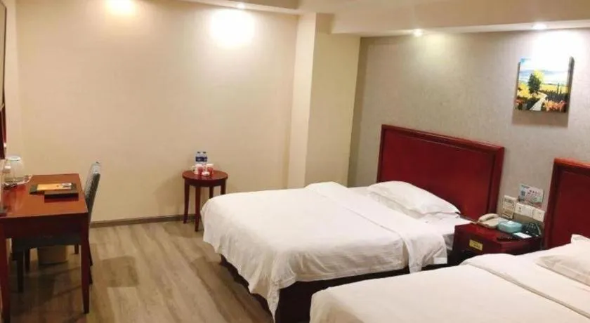 Bed in GreenTree Inn Suzhou Shengze Hotel